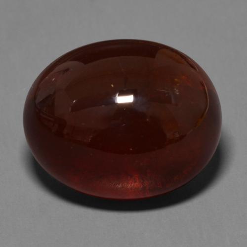 33.34カラットの天然赤みがかった茶スペサルティンガーネット（18.6×15.2 mm・オーバルカット）