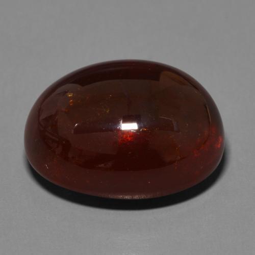33.34カラットの天然赤みがかった茶スペサルティンガーネット（18.6×15.2 mm・オーバルカット）