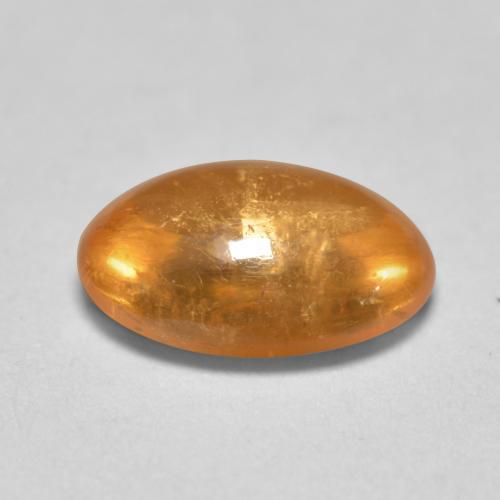 0.82カラットの天然アプリコットオレンジスペサルティンガーネット（6.5×4.6 mm・オーバルカット）