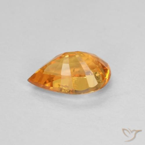 0.58カラットの天然アプリコットオレンジスペサルティンガーネット（6.1×4 mm・洋梨の形）