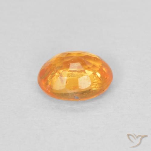 0.45カラットの天然ミディアムオレンジスペサルティン ガーネット、楕円形、VS
