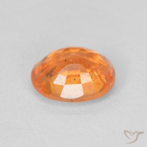 0.56カラットの天然鮮やかなオレンジスペサルティン ガーネット、楕円形、VS-SI