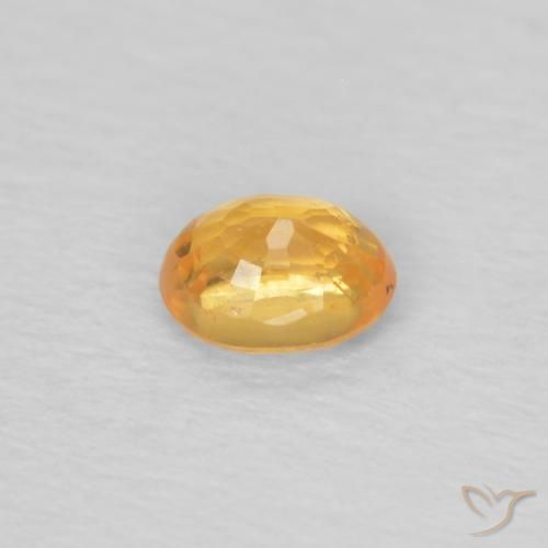 0.25カラットの天然オレンジゴールドスペサルティン ガーネット、楕円形、VS