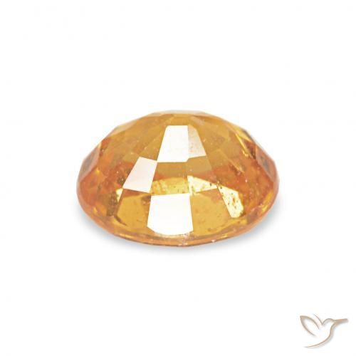 0.60カラットの天然ミディアムオレンジスペサルティン ガーネット、楕円形、VS-SI