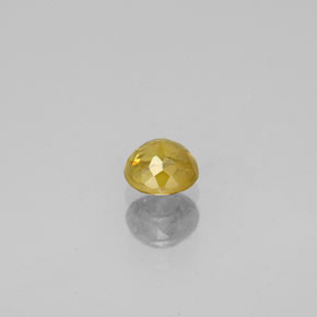 0.44カラットの天然緑がかったゴールドスフェーン（4.40 mm・ラウンドカット）