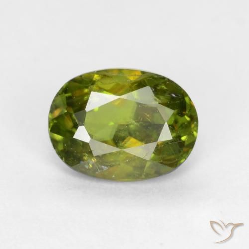 0.65ct 天然 ウォームアーシーグリーン スフェーン, 楕円形, SI, Photo A
