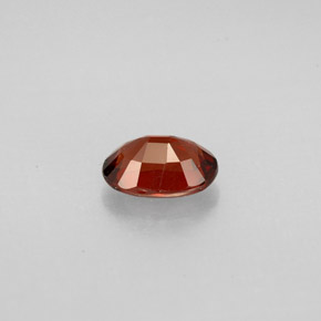 0.75カラットの天然オレンジレッドスピネル（6.5×4.6 mm・オーバルカット）