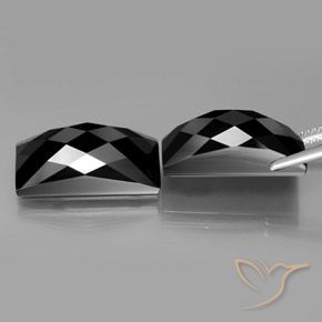 Shop natural 25.72ct ゴールドシーンのあるブラック スピネル gems, バゲット, from タイ at GemSelect. In stock, global shipping!