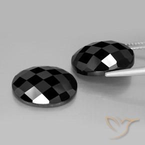 Shop natural 21.70ct ブラック スピネル gems, 楕円形, from タイ at GemSelect. In stock, global shipping!