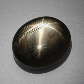 32.74カラットの天然ブラックスターサファイア、オーバルカット、オペーク