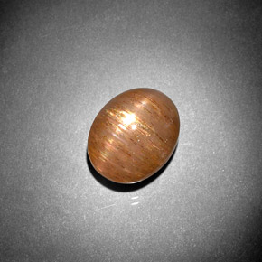 5.57カラットの天然ゴールドブラウンスターサンストーン、オーバルカット、オペーク