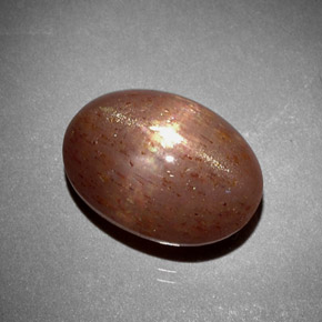 6.85カラットの天然ゴールドブラウンスターサンストーン、オーバルカット、オペーク