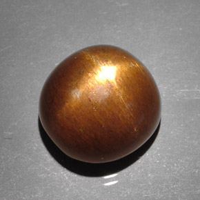 8.95カラットの天然ゴールドブラウンスターサンストーン、オーバルカット、オペーク