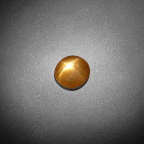 0.85カラットの天然ゴールドブラウンスターサンストーン、オーバルカット、オペーク