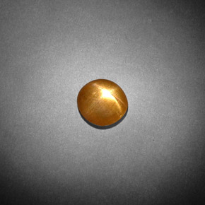 0.85カラットの天然ゴールドブラウンスターサンストーン、オーバルカット、オペーク