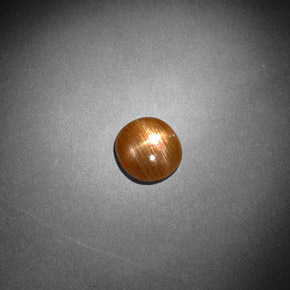 0.85カラットの天然ゴールドブラウンスターサンストーン、オーバルカット、オペーク