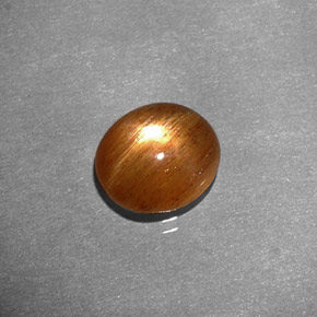 1.34カラットの天然ゴールドブラウンスターサンストーン、オーバルカット、オペーク