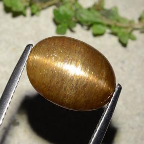 7.67カラットの天然ゴールドブラウンスターサンストーン、オーバルカット、オペーク