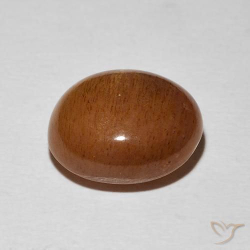 7.38カラットの天然ミディアムオレンジスターサンストーン（13.1×11.7 mm・オーバルカット）