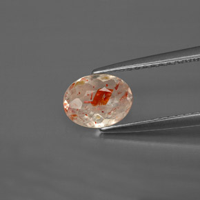 0.69カラットの天然オレンジサンストーン（7.5×5.7 mm・透明）