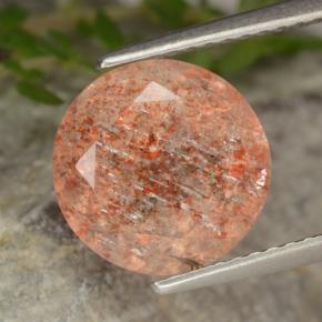 4.25カラットの天然赤みがかったオレンジサンストーン、ラウンドカット、半透明