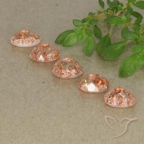 Shop natural 4.18ct ミディアム薄いオレンジ サンストーン gems, 楕円形, from ロシア at GemSelect. In stock, global shipping!