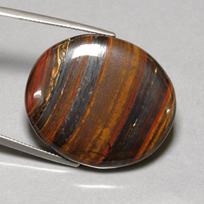 53.09カラットの天然マルチカラーTiger's Eye Matrix（31×26.7 mm・オーバルカット）