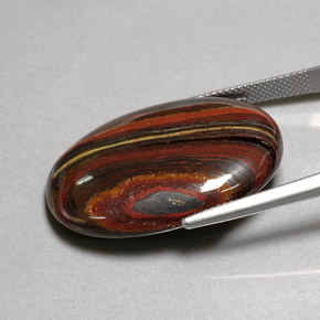 45.58カラットの天然マルチカラーTiger's Eye Matrix（30.9×21.6 mm・オーバルカット）