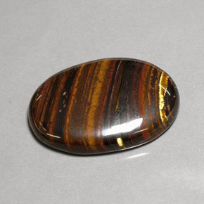 43.53カラットの天然マルチカラーTiger's Eye Matrix（31×22.3 mm・オーバルカット）