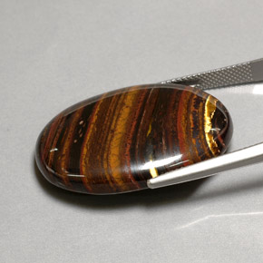 43.53カラットの天然マルチカラーTiger's Eye Matrix（31×22.3 mm・オーバルカット）