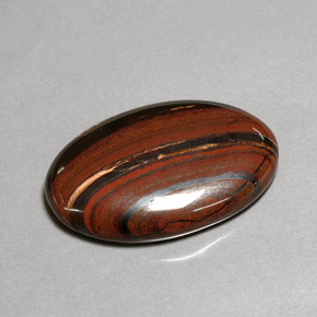 35.01カラットの天然マルチカラーTiger's Eye Matrix（29.9×20 mm・オーバルカット）
