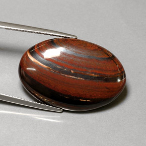 35.01カラットの天然マルチカラーTiger's Eye Matrix（29.9×20 mm・オーバルカット）