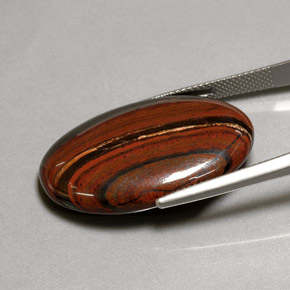 35.01カラットの天然マルチカラーTiger's Eye Matrix（29.9×20 mm・オーバルカット）