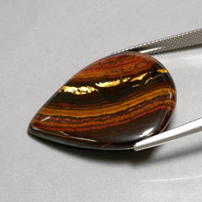 37.44カラットの天然マルチカラーTiger's Eye Matrix（31×26.9 mm・洋梨の形）