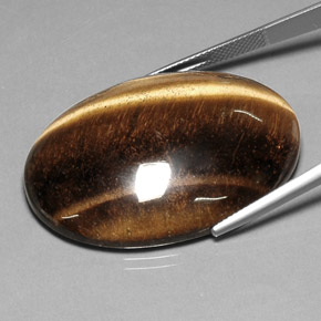 78.03カラットの天然ゴールドブラウンTiger's Eye（40.7×30.7 mm・オーバルカット）