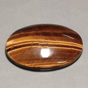 74.22カラットの天然ゴールドブラウンTiger's Eye（39.9×30 mm・オーバルカット）