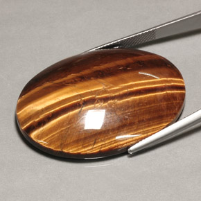 74.22カラットの天然ゴールドブラウンTiger's Eye（39.9×30 mm・オーバルカット）