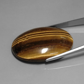 76.92カラットの天然ゴールドブラウンTiger's Eye（40×29.9 mm・オーバルカット）