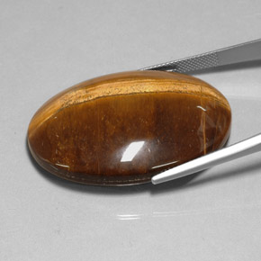 78.13カラットの天然ゴールドブラウンTiger's Eye（40×30.1 mm・オーバルカット）