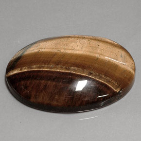75.54カラットの天然ゴールドブラウンタイガーズアイ、オーバルカット、オペーク