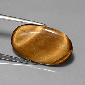 10.07カラットの天然ゴールドブラウンTiger's Eye（24.4×14.6 mm・オーバルカット）