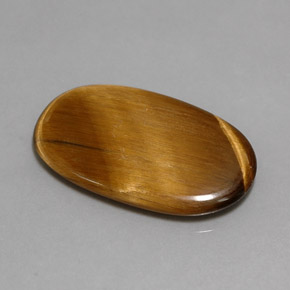 10.07カラットの天然ゴールドブラウンTiger's Eye（24.4×14.6 mm・オーバルカット）
