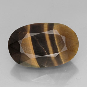 13.19カラットの天然マルチカラーTiger's Eye（19.7×12.5 mm・オーバルカット）