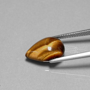 5.01カラットの天然ゴールドブラウンタイガーズアイ、洋梨の形、オペーク
