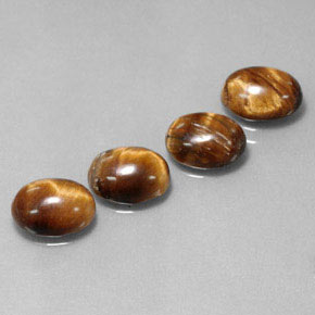 カラットの天然ゴールドブラウンTiger's Eye（8.8×6.9 mm・オーバルカット）