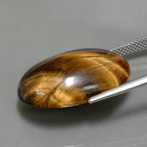 23.72カラットの天然ゴールドブラウンTiger's Eye（23.8×16.3 mm・オーバルカット）