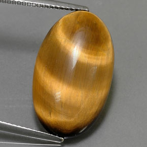 11.94カラットの天然ゴールドブラウンTiger's Eye（22.3×13.3 mm・オーバルカット）