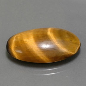 11.94カラットの天然ゴールドブラウンTiger's Eye（22.3×13.3 mm・オーバルカット）