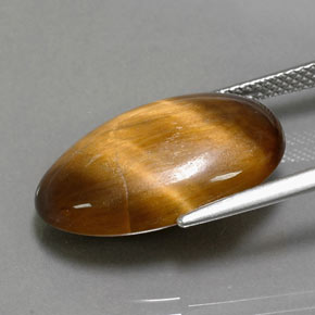 13.32カラットの天然ゴールドブラウンTiger's Eye（20.8×13.8 mm・オーバルカット）