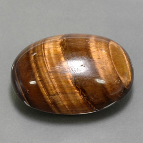 24.80カラットの天然ゴールドブラウンTiger's Eye（21.7×16.8 mm・オーバルカット）
